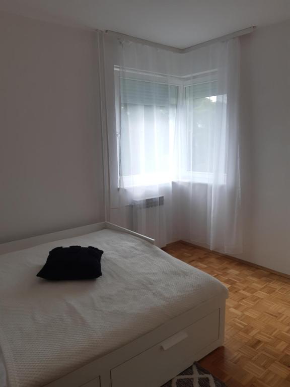 Posteľ alebo postele v izbe v ubytovaní Blaslov Family Apartment