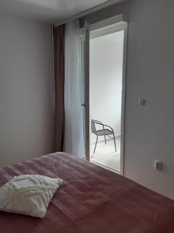 Posteľ alebo postele v izbe v ubytovaní Blaslov Family Apartment
