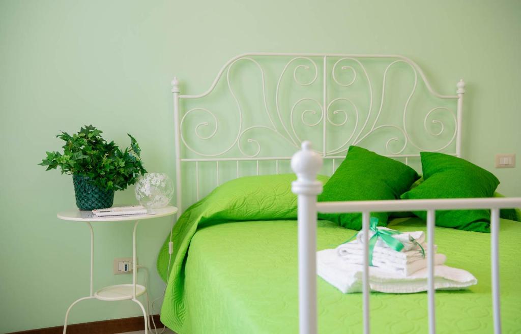 Postel nebo postele na pokoji v ubytování Casa di Nora