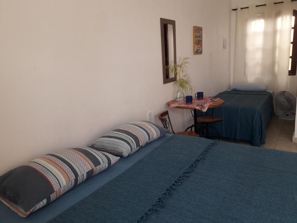 Postel nebo postele na pokoji v ubytování A Taberna - chalés