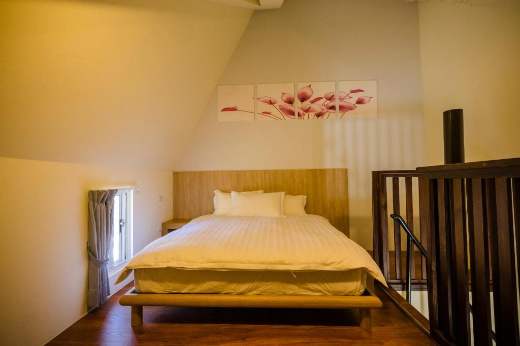 Postel nebo postele na pokoji v ubytování Le Retour Du Printemps Villa