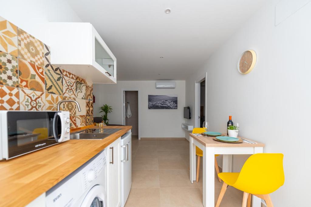 Kuchyň nebo kuchyňský kout v ubytování Apartamentos Manuel Roio