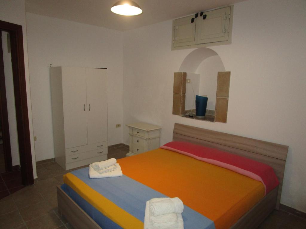 Postel nebo postele na pokoji v ubytování Zurigo Val di Noto