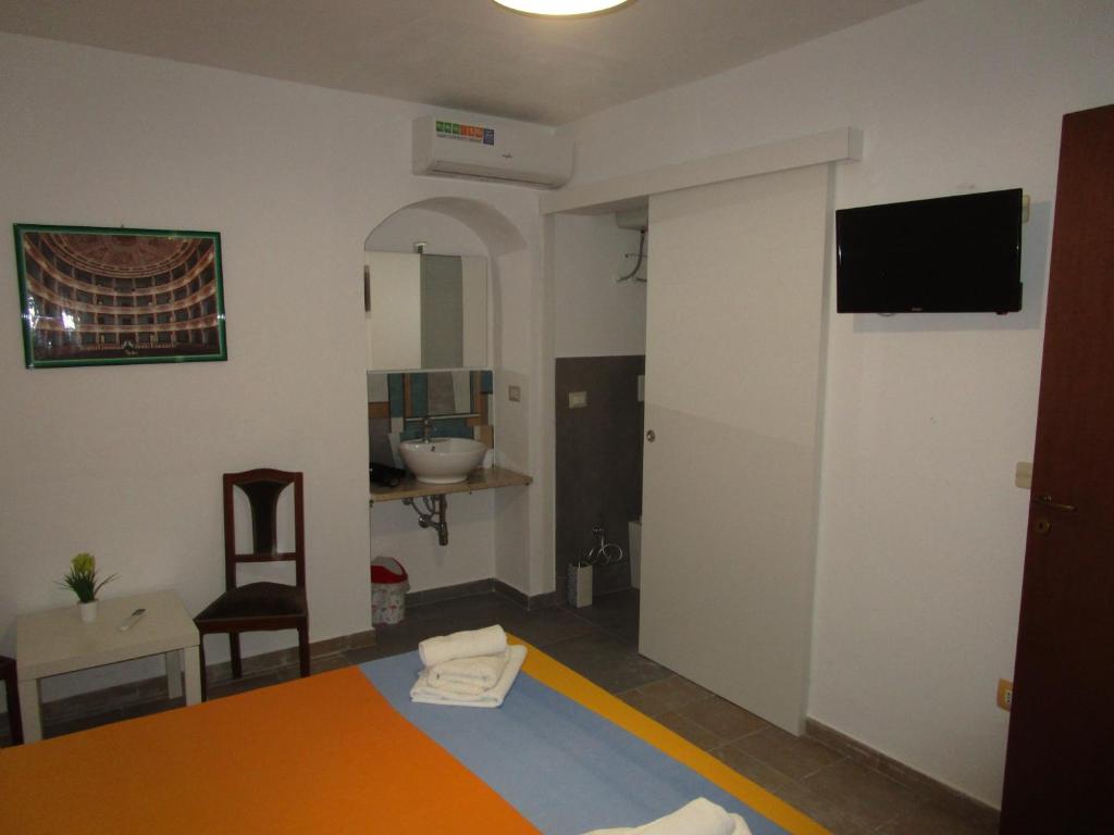 Postel nebo postele na pokoji v ubytování Zurigo Val di Noto