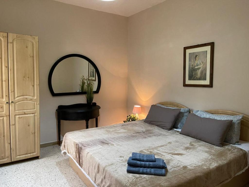 Кровать или кровати в номере Olivier House Mellieha