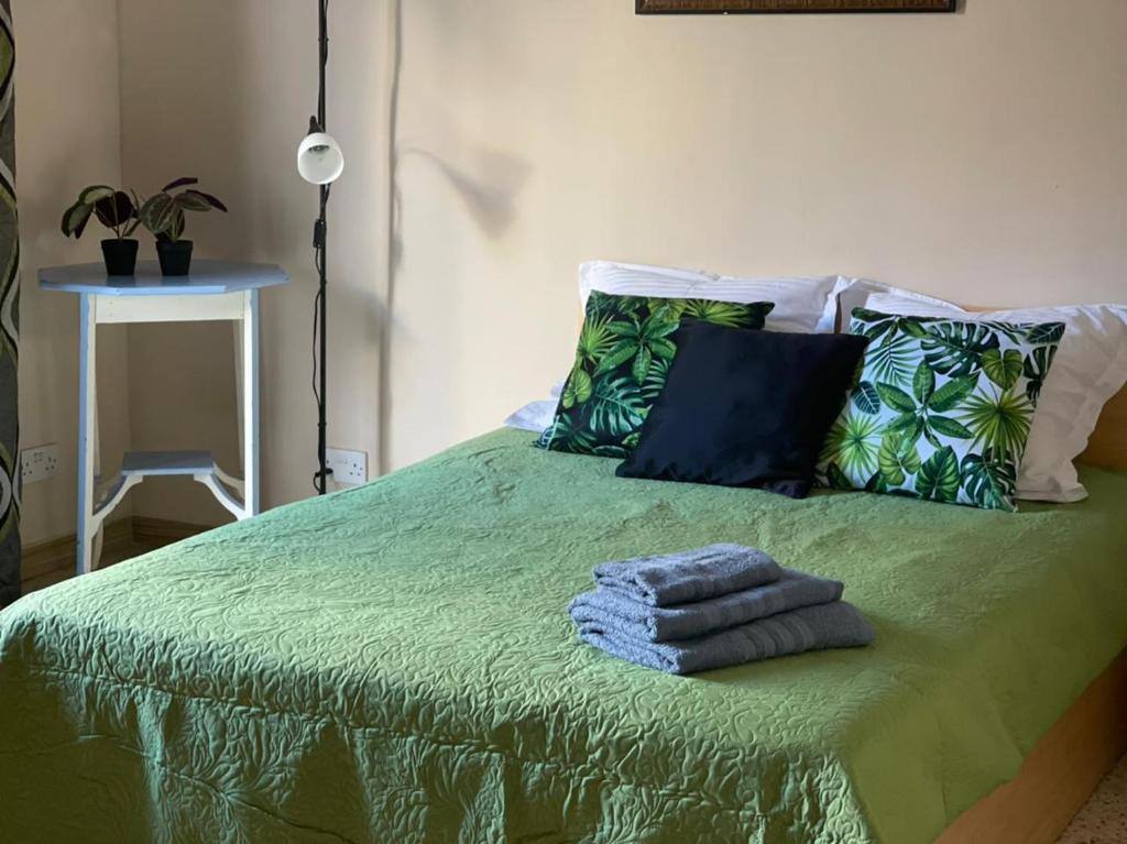 Кровать или кровати в номере Olivier House Mellieha