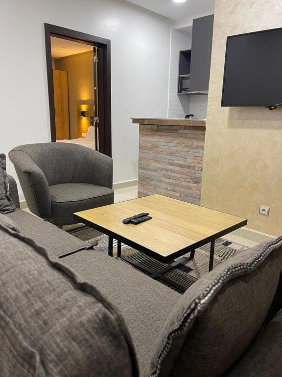 TV a/nebo společenská místnost v ubytování CasaHouse Apparts