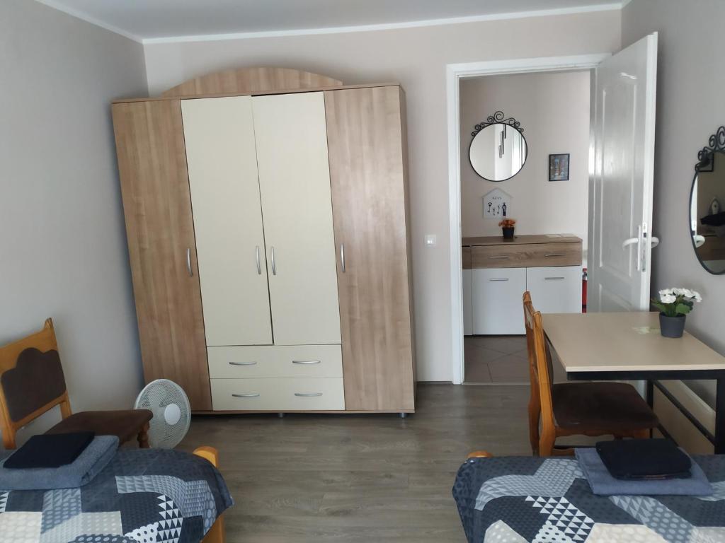 Postel nebo postele na pokoji v ubytování ARIANA apartman