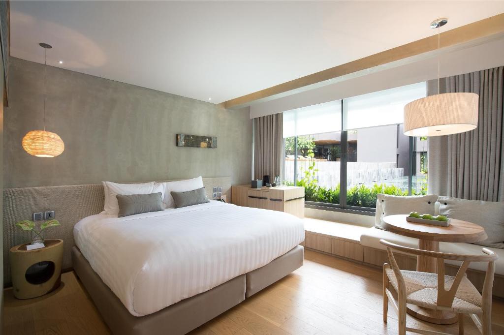Postel nebo postele na pokoji v ubytování Ad Lib Hotel Bangkok