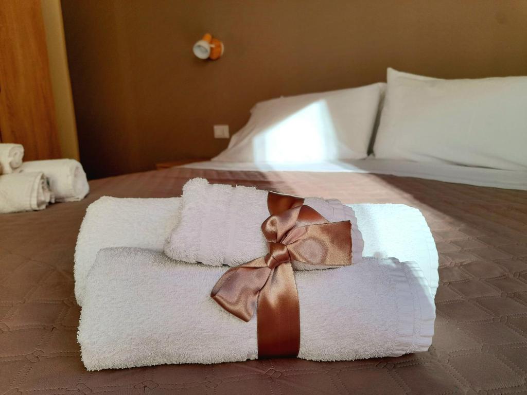 A bed or beds in a room at La Perla di Palermo