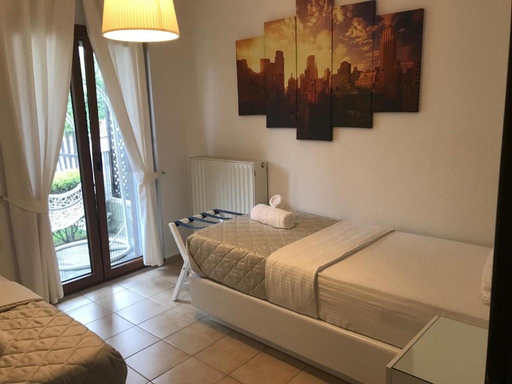 Postel nebo postele na pokoji v ubytování Amaryllis House