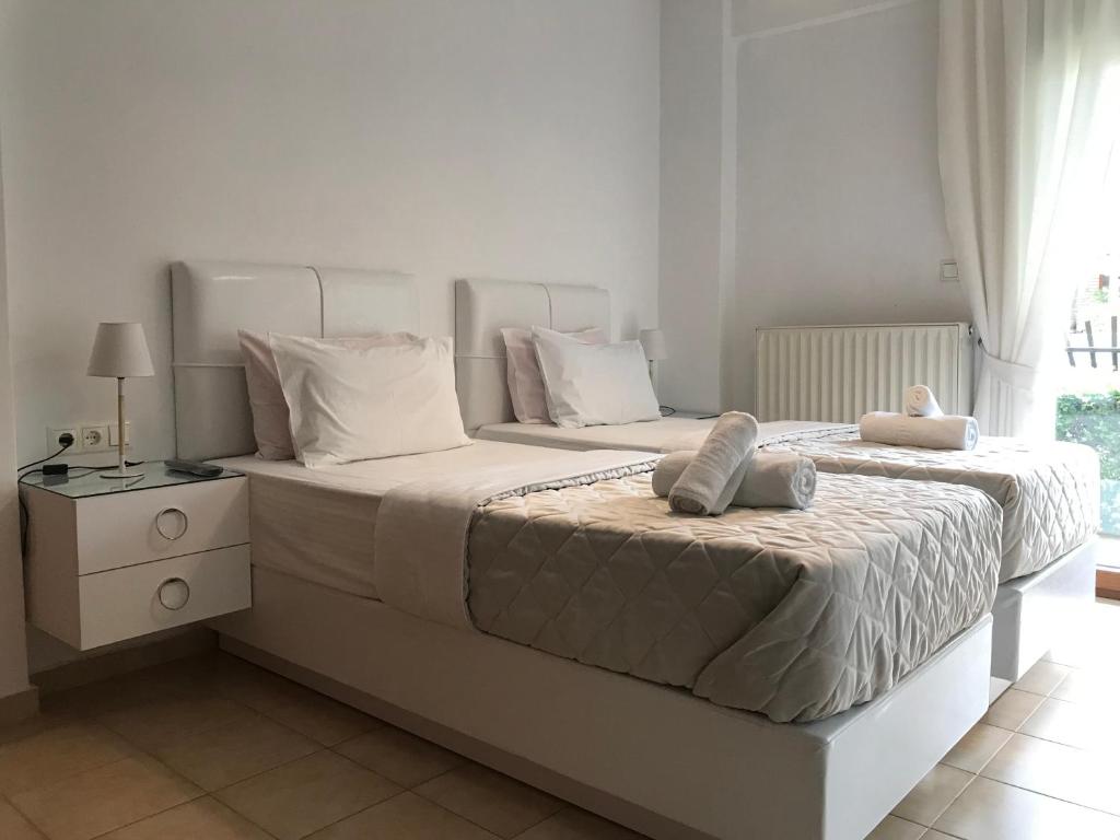 Postel nebo postele na pokoji v ubytování Amaryllis House
