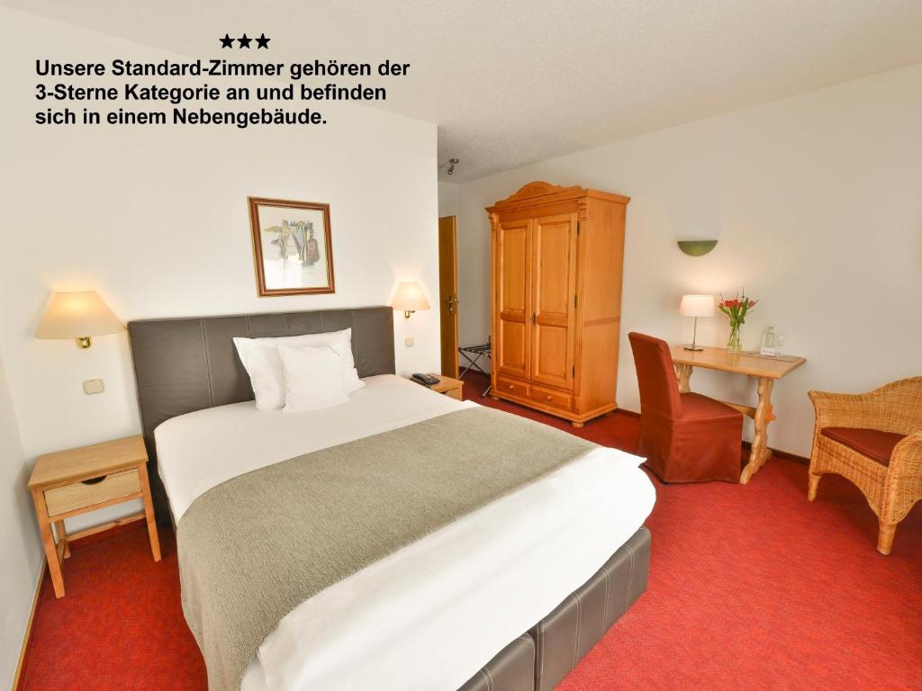 Postel nebo postele na pokoji v ubytování Hotel Antoniushütte