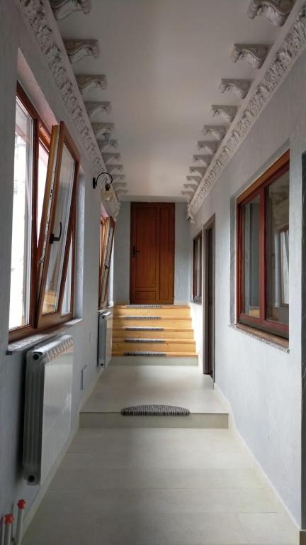 Postel nebo postele na pokoji v ubytování Casa Irimescu
