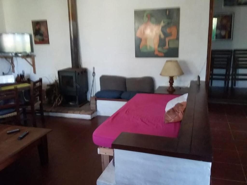 Postel nebo postele na pokoji v ubytování Las Cabañas de Ana