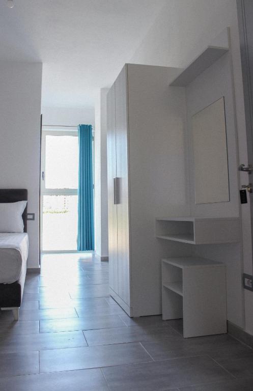 Postel nebo postele na pokoji v ubytování LUMNIK - Shengjin- Hotel & Apartments