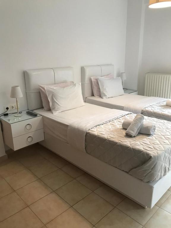 Postel nebo postele na pokoji v ubytování Amaryllis House