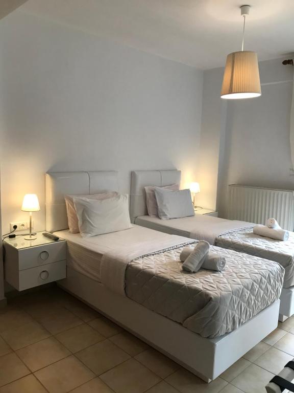 Postel nebo postele na pokoji v ubytování Amaryllis House