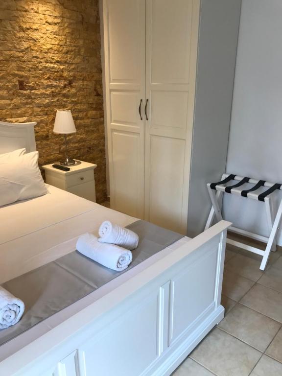 Postel nebo postele na pokoji v ubytování Amaryllis House