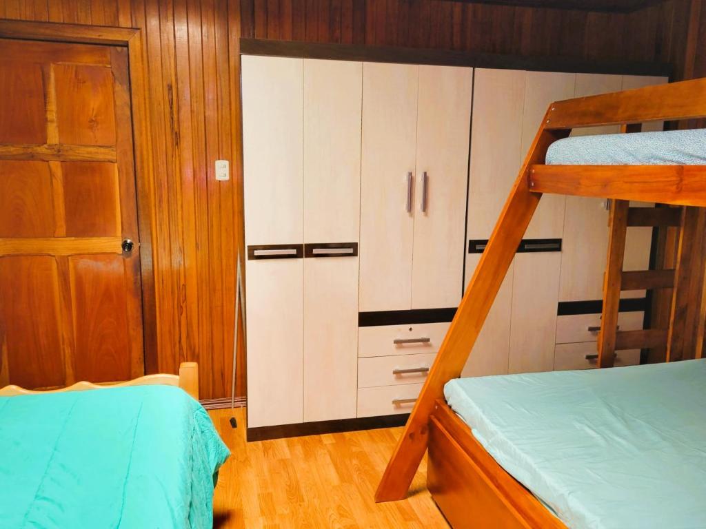 Postel nebo postele na pokoji v ubytování Casa Flores