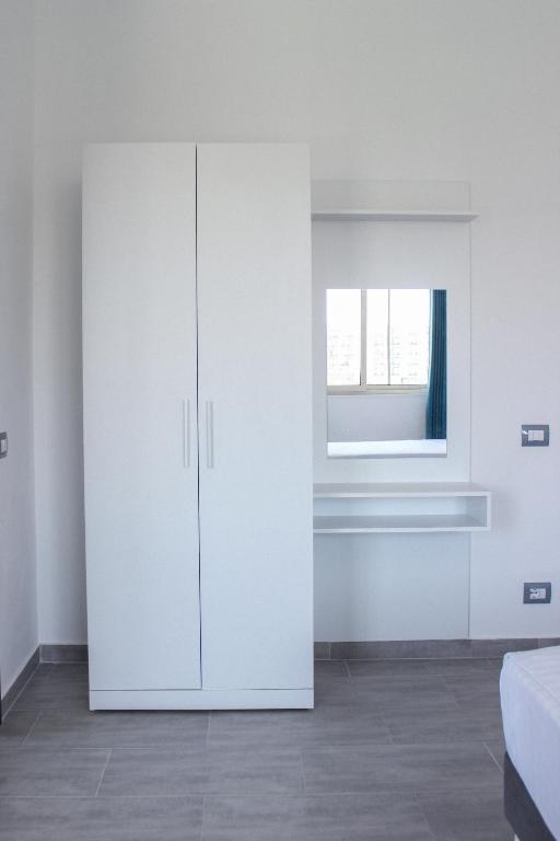 Postel nebo postele na pokoji v ubytování LUMNIK - Shengjin- Hotel & Apartments