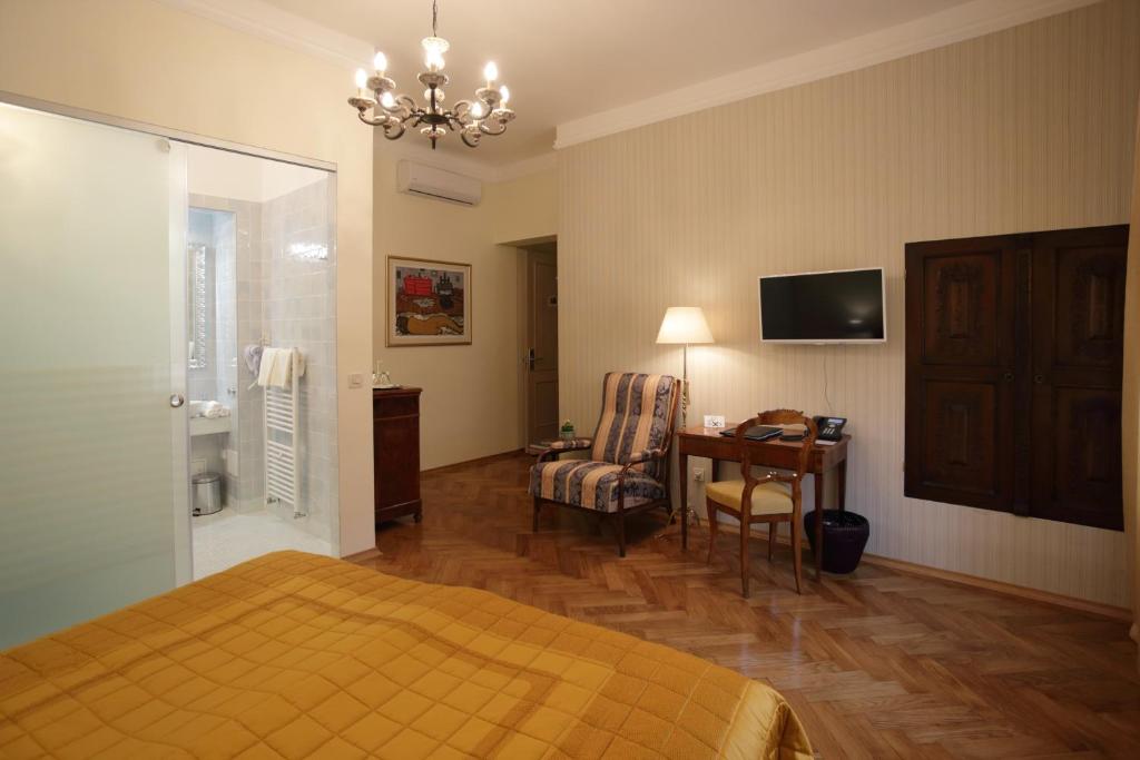 Televízia a/alebo spoločenská miestnosť v ubytovaní B&B Fotić
