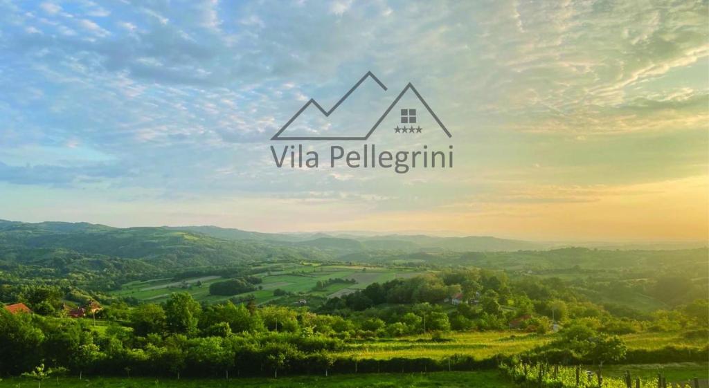 Vila Pellegrini في أراندجيلوفاك: صورة منزل على تلة مع الكلمات عبر بيليجرميني