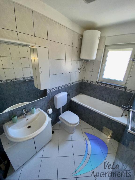 Kúpeľňa v ubytovaní VeLa Apartments