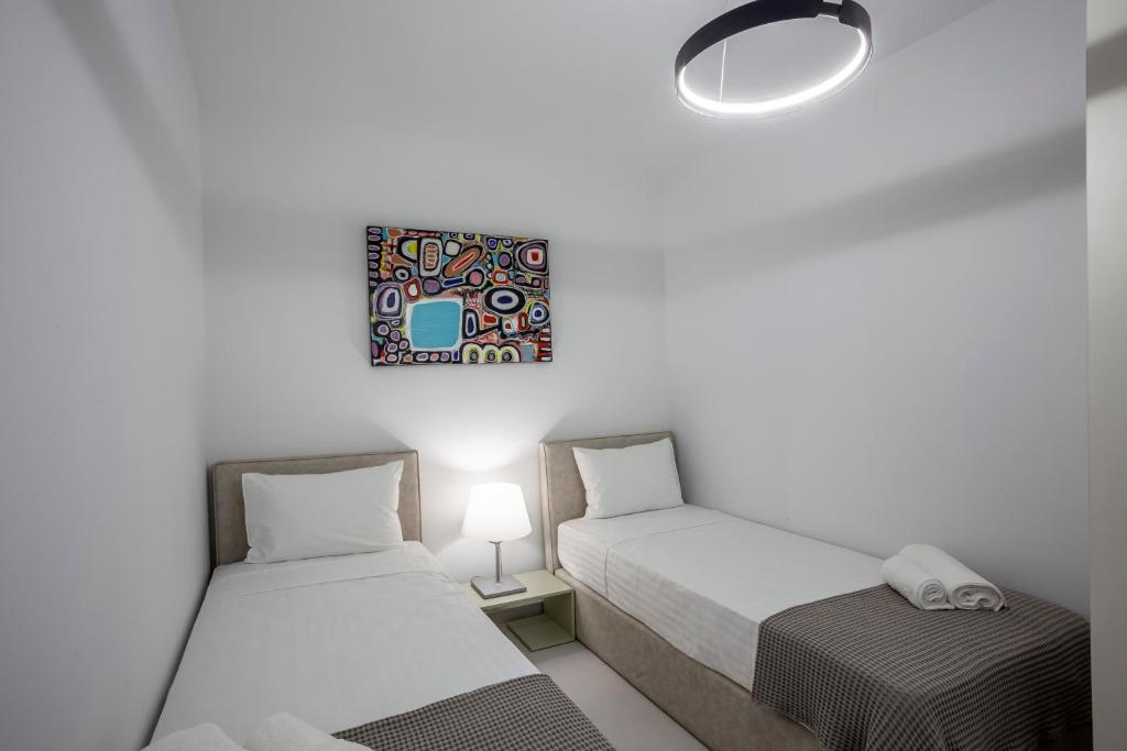 Posteľ alebo postele v izbe v ubytovaní Habitat 29 A