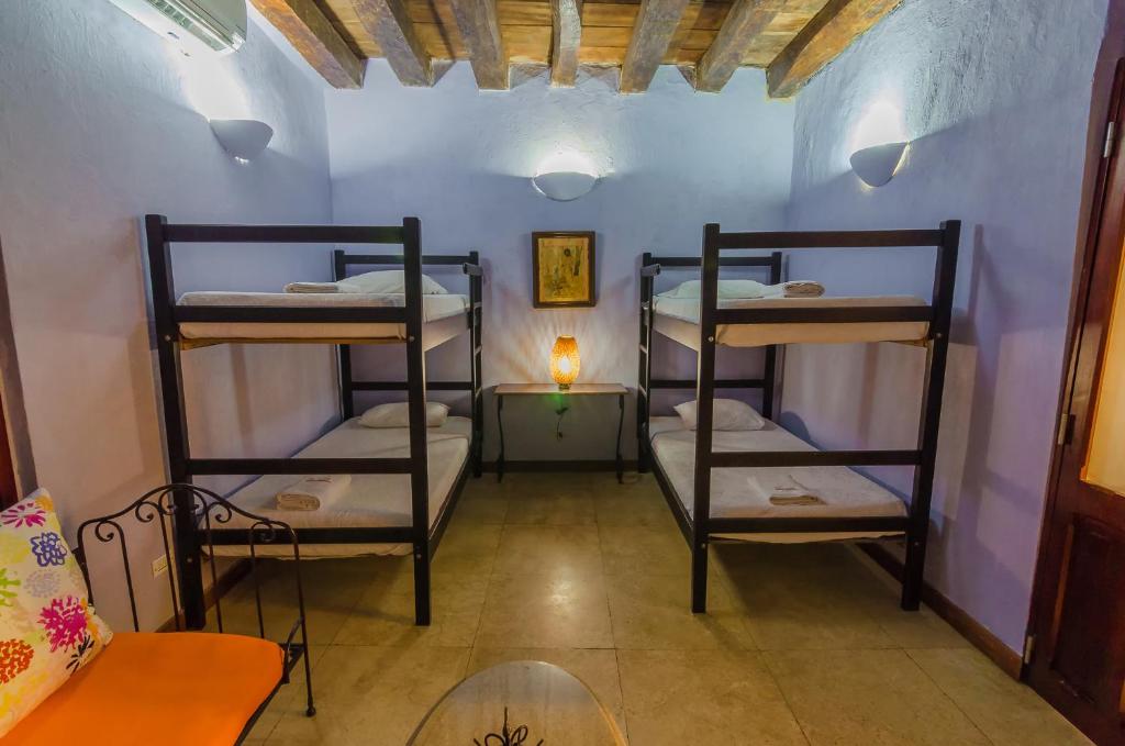 Postel nebo postele na pokoji v ubytování Casa Cordoba Román