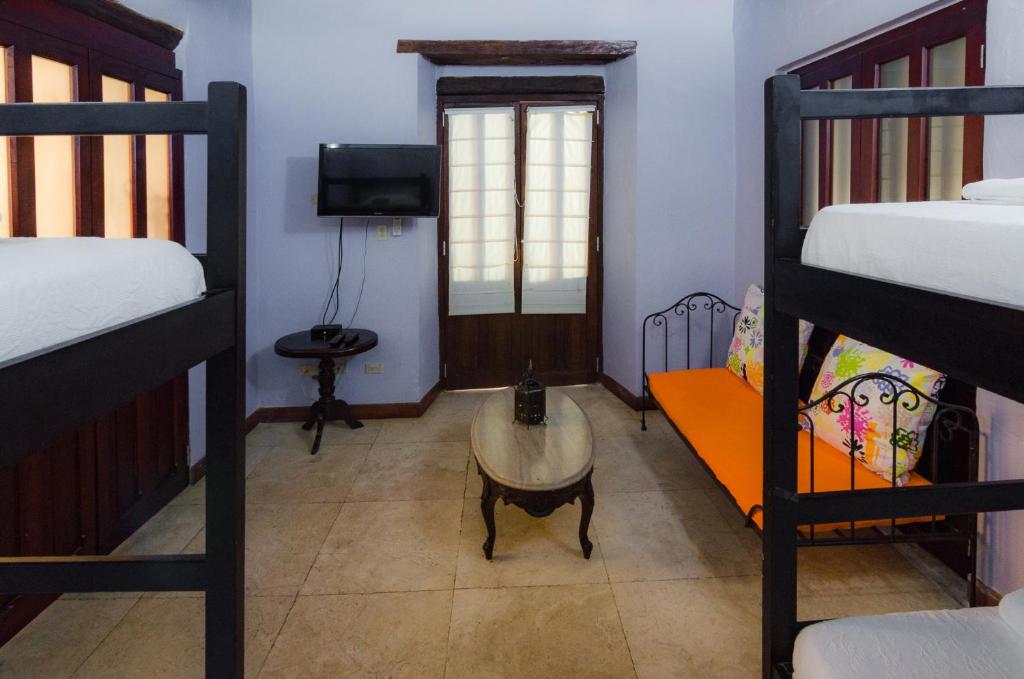 Postel nebo postele na pokoji v ubytování Casa Cordoba Román