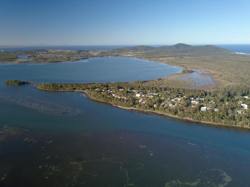 an aerial view of a large body of water at Green Point Boat House in Tiona