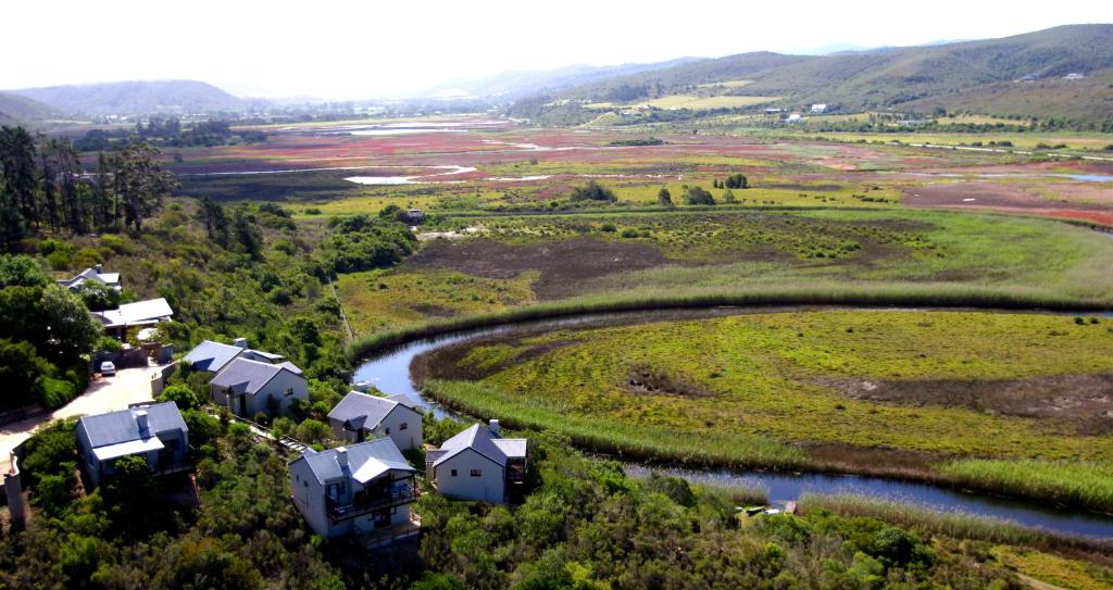 an aerial view of a village and a river at Emily Moon River Lodge in Plettenberg Bay