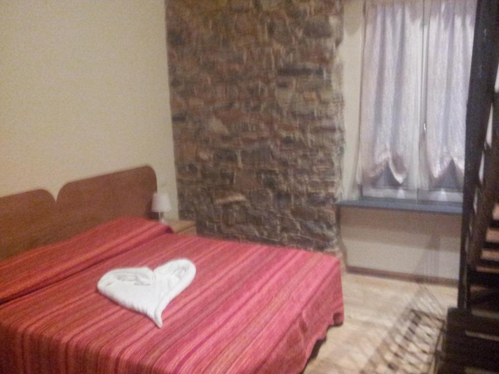 Postel nebo postele na pokoji v ubytování Apartment Camere Cinque Terre Andrea
