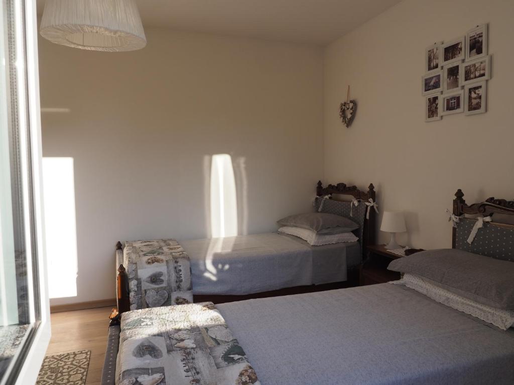 A bed or beds in a room at Casa vacanze Lepa Vida
