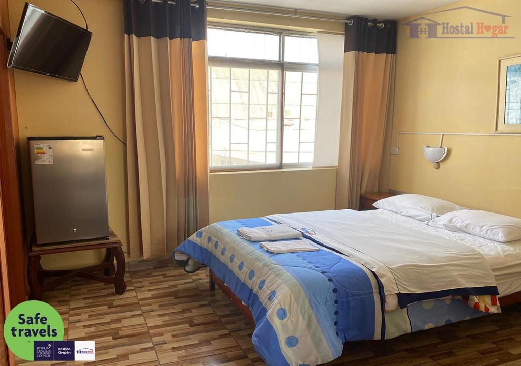 Postel nebo postele na pokoji v ubytování HOSTAL HOGAR 3 Estrellas - CHEPÉN