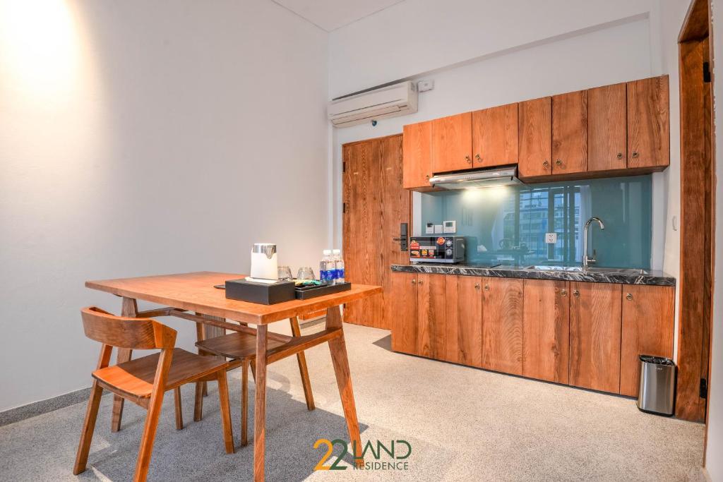 Kuchyň nebo kuchyňský kout v ubytování 22Land Hotel & Residence