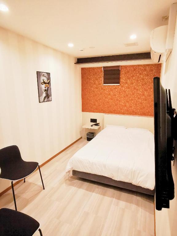 Postel nebo postele na pokoji v ubytování Hotel mond omiya