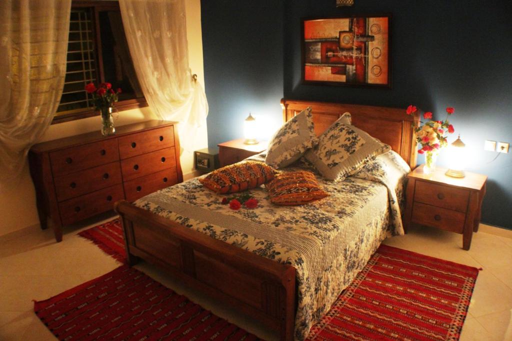 Postel nebo postele na pokoji v ubytování Riad Mimosa