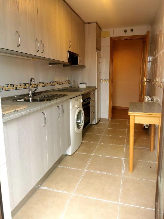 Kuchyň nebo kuchyňský kout v ubytování Riaza Vacacional - Apartamento en el centro