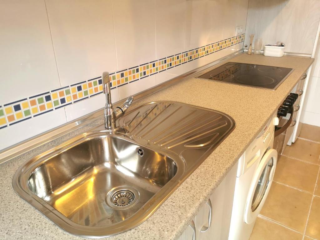 Kuchyň nebo kuchyňský kout v ubytování Riaza Vacacional - Apartamento en el centro