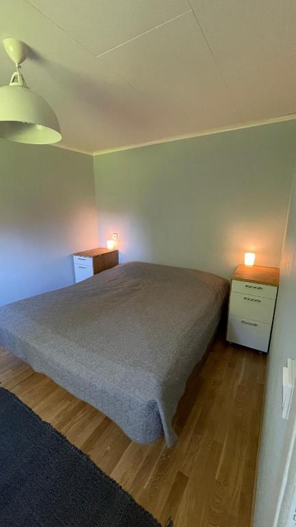 Postel nebo postele na pokoji v ubytování Floda, Minihus på 62m2 för plats för 4 vuxna och 2 barn