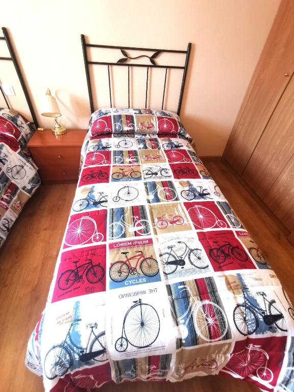 Postel nebo postele na pokoji v ubytování Riaza Vacacional - Apartamento en el centro