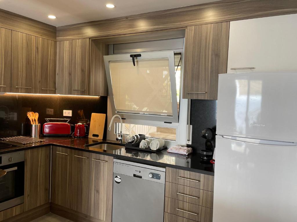 Kuchyňa alebo kuchynka v ubytovaní OverTheSea - PUEBLECITO Apartment