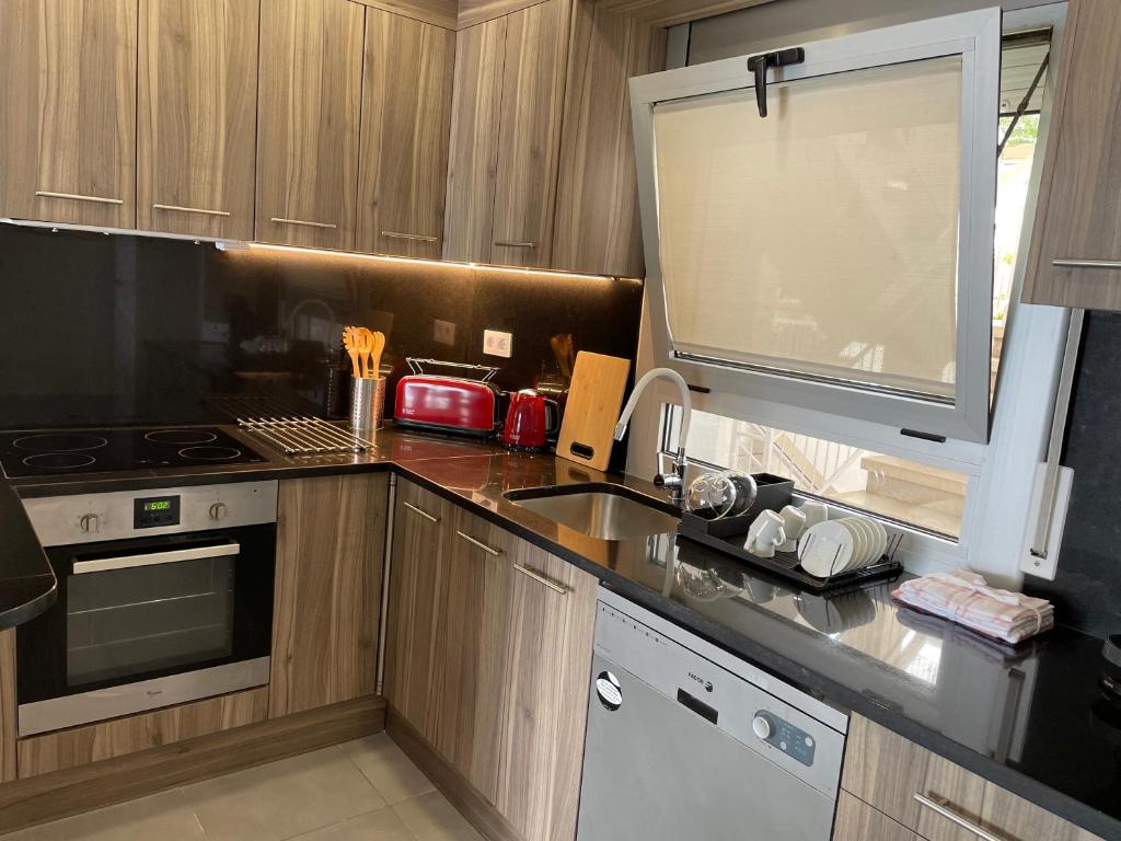 Kuchyňa alebo kuchynka v ubytovaní OverTheSea - PUEBLECITO Apartment