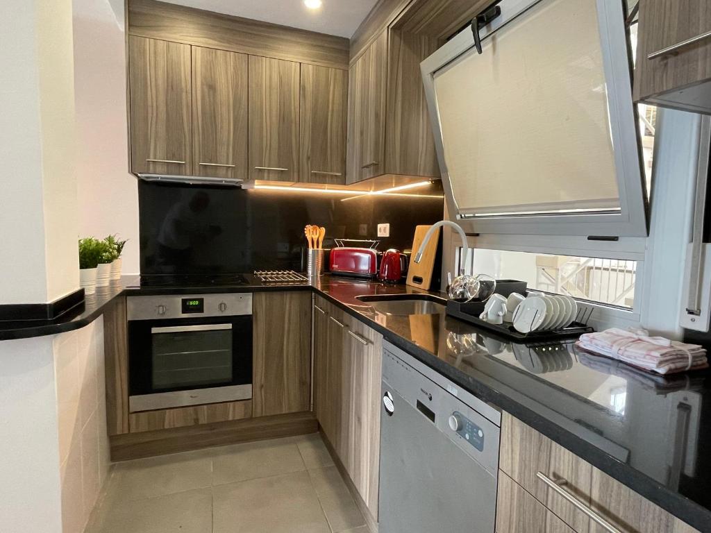 Kuchyňa alebo kuchynka v ubytovaní OverTheSea - PUEBLECITO Apartment