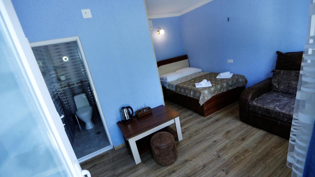 Postel nebo postele na pokoji v ubytování Lilia guesthouse