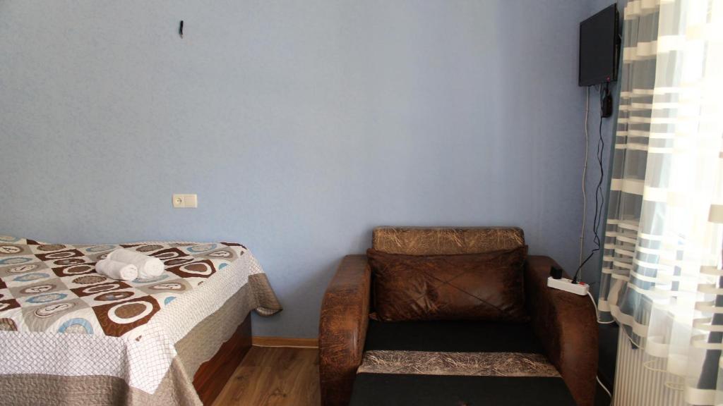 Postel nebo postele na pokoji v ubytování Lilia guesthouse