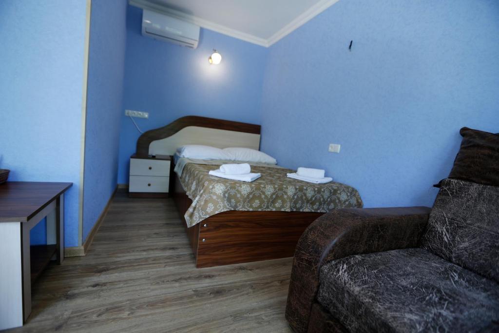 Postel nebo postele na pokoji v ubytování Lilia guesthouse