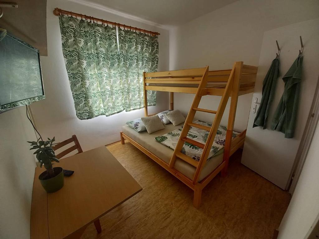 Postel nebo postele na pokoji v ubytování Afrodita